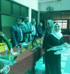 The Political Guidance Commission Honoring Al-Qabas School for Visually Impaired on the International Women's Day.